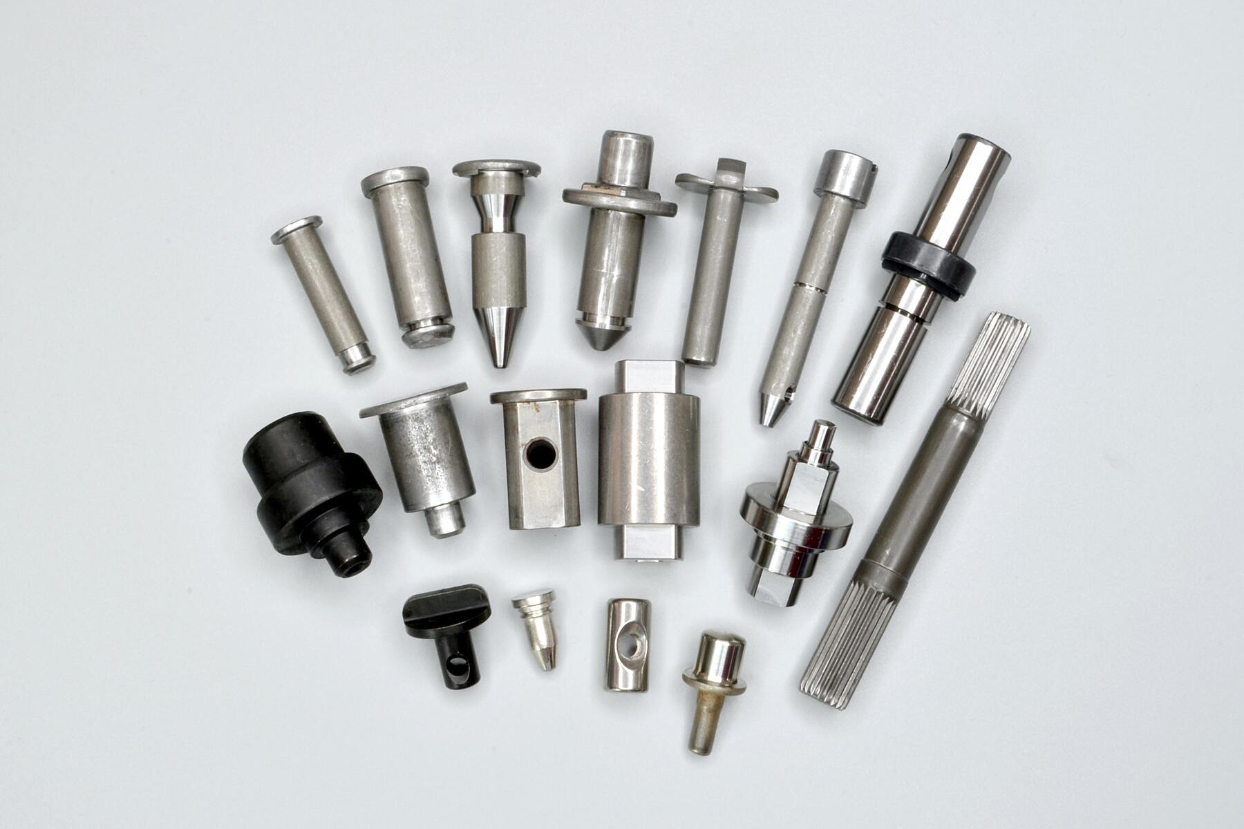 Lien Ya straight and stepped pins with shoulders, grooves and cross-drilled features